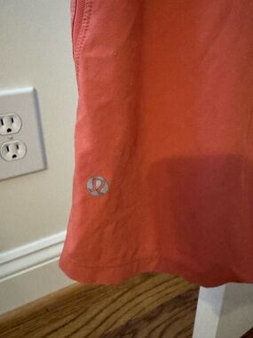 Lululemon sour cherry color pace breakers 7” linerless (S)